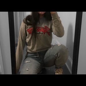 cute sweatshirt that says “superior authentic”